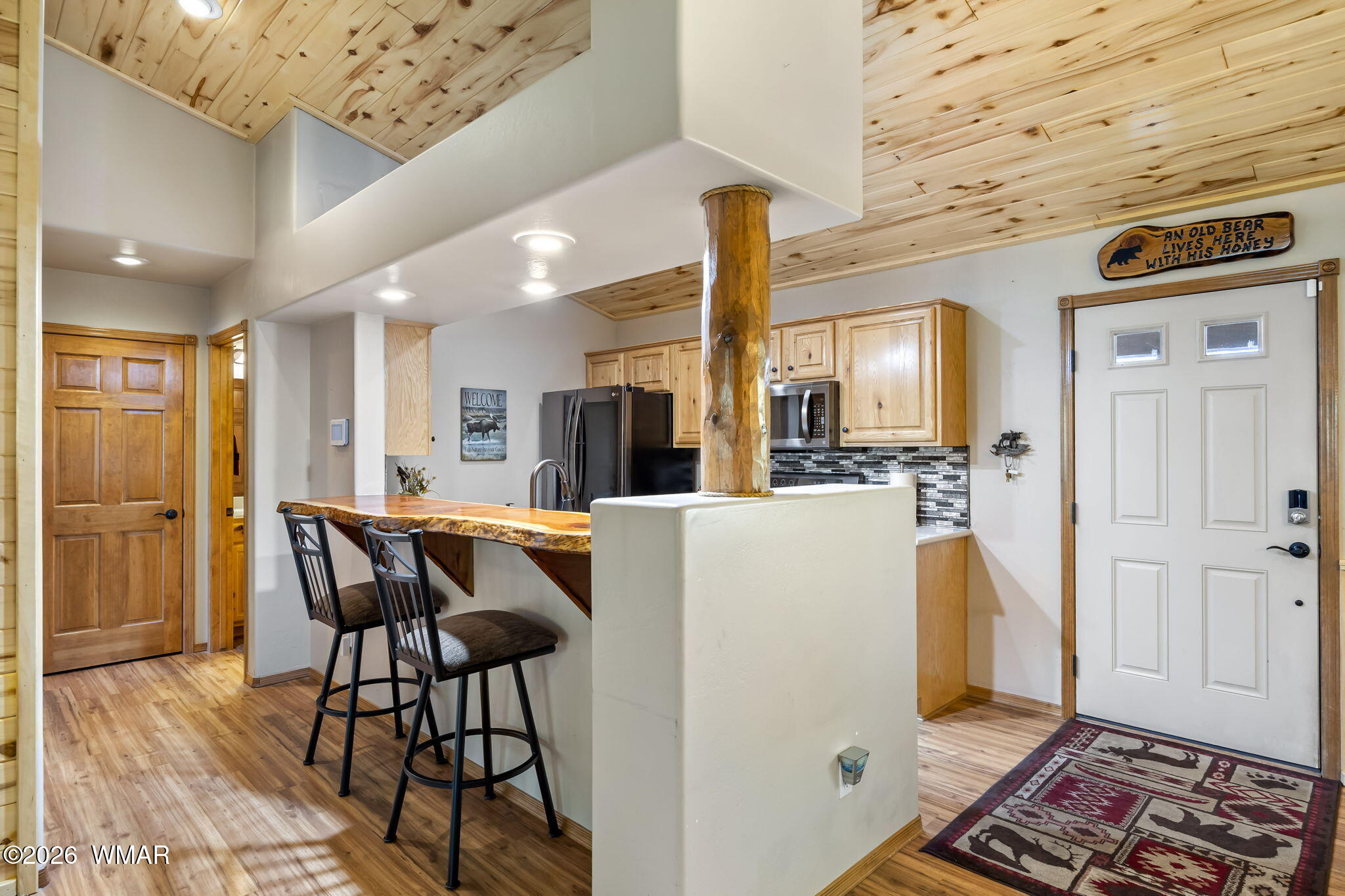 2337 Buffalo Loop Overgaard, AZ 85933 - Photo 5 of 43 a view of kitchen with furniture and wooden floor