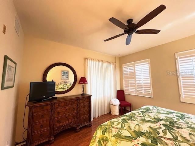 2060 Matecumbe Key Road, Unit 2301 Punta Gorda, FL 33955 - Photo 12 of 41 a bedroom with a bed and a dresser