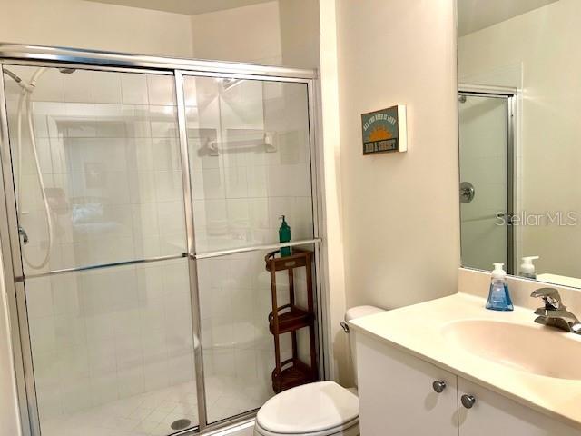 2060 Matecumbe Key Road, Unit 2301 Punta Gorda, FL 33955 - Photo 16 of 41 a bathroom with a sink toilet and shower