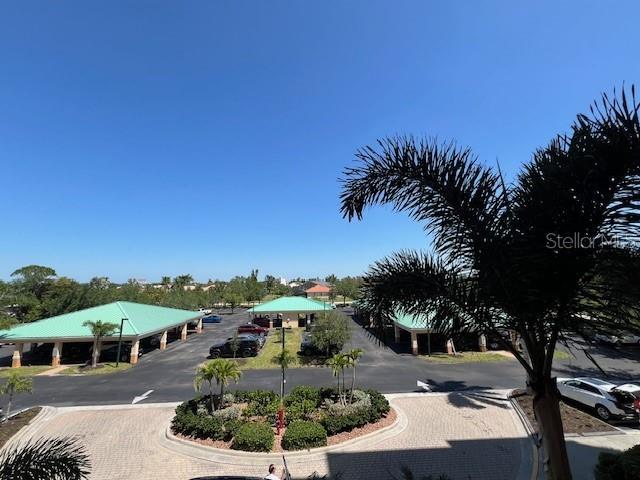2060 Matecumbe Key Road, Unit 2301 Punta Gorda, FL 33955 - Photo 40 of 41 a view of a street with a building in the background
