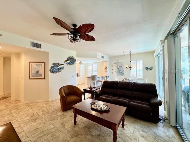 2060 Matecumbe Key Road, Unit 2301 Punta Gorda, FL 33955 - Photo 6 of 41 a living room with furniture a rug and a window