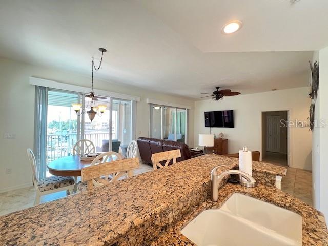 2060 Matecumbe Key Road, Unit 2301 Punta Gorda, FL 33955 - Photo 9 of 41 a bedroom with furniture and a large window