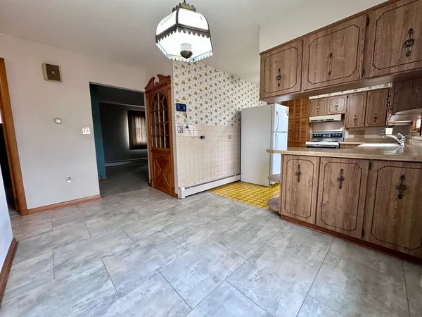 a view of a kitchen with a sink