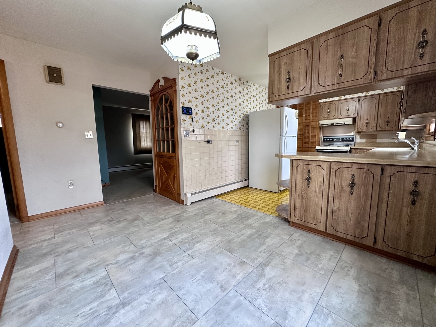 3912 Emerson Road Sterling, IL 61081 - Photo 7 of 22 a view of a kitchen with a sink