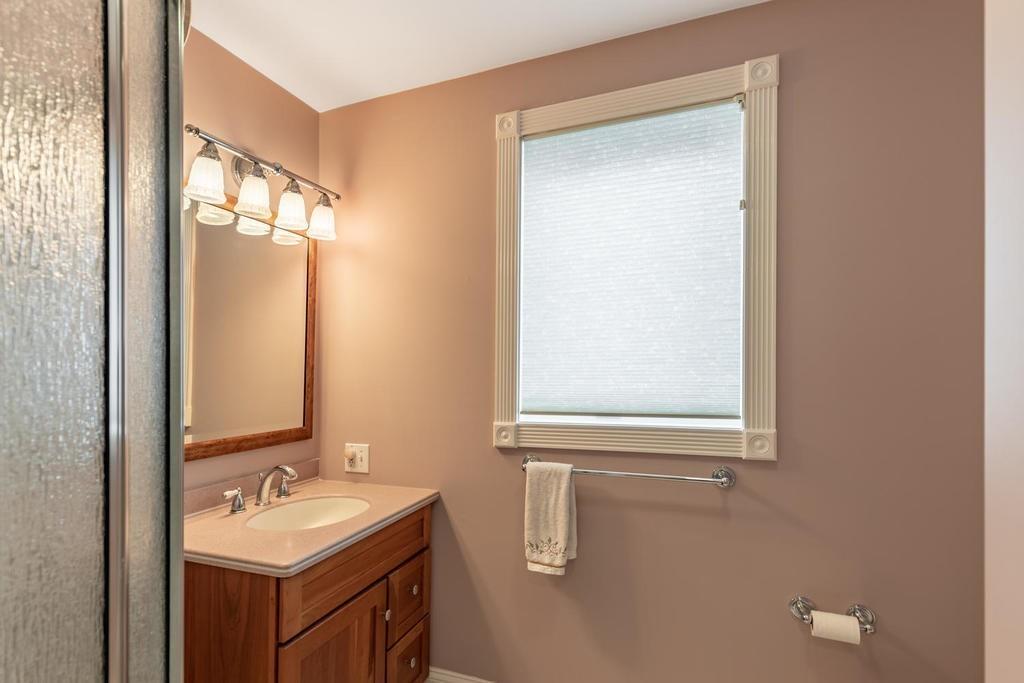 79 Clark Road Ipswich, MA 01938 - Photo 11 of 35 a bathroom with a sink and a mirror