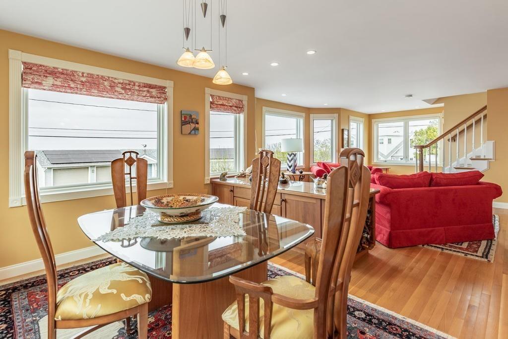 79 Clark Road Ipswich, MA 01938 - Photo 16 of 35 a view of a dining room with furniture and a window