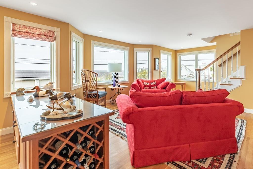 79 Clark Road Ipswich, MA 01938 - Photo 17 of 35 a living room with furniture and a large window