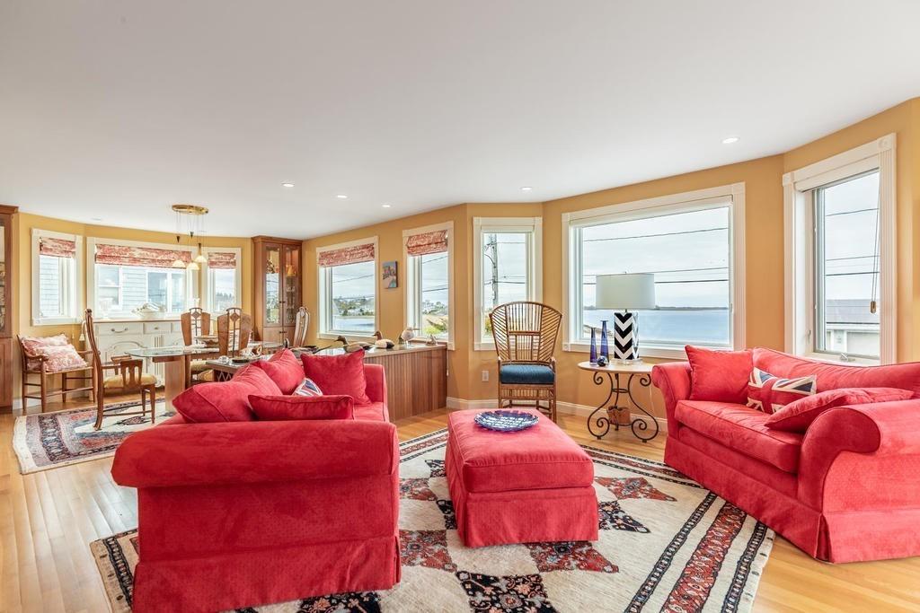 79 Clark Road Ipswich, MA 01938 - Photo 18 of 35 a living room with furniture and a floor to ceiling window