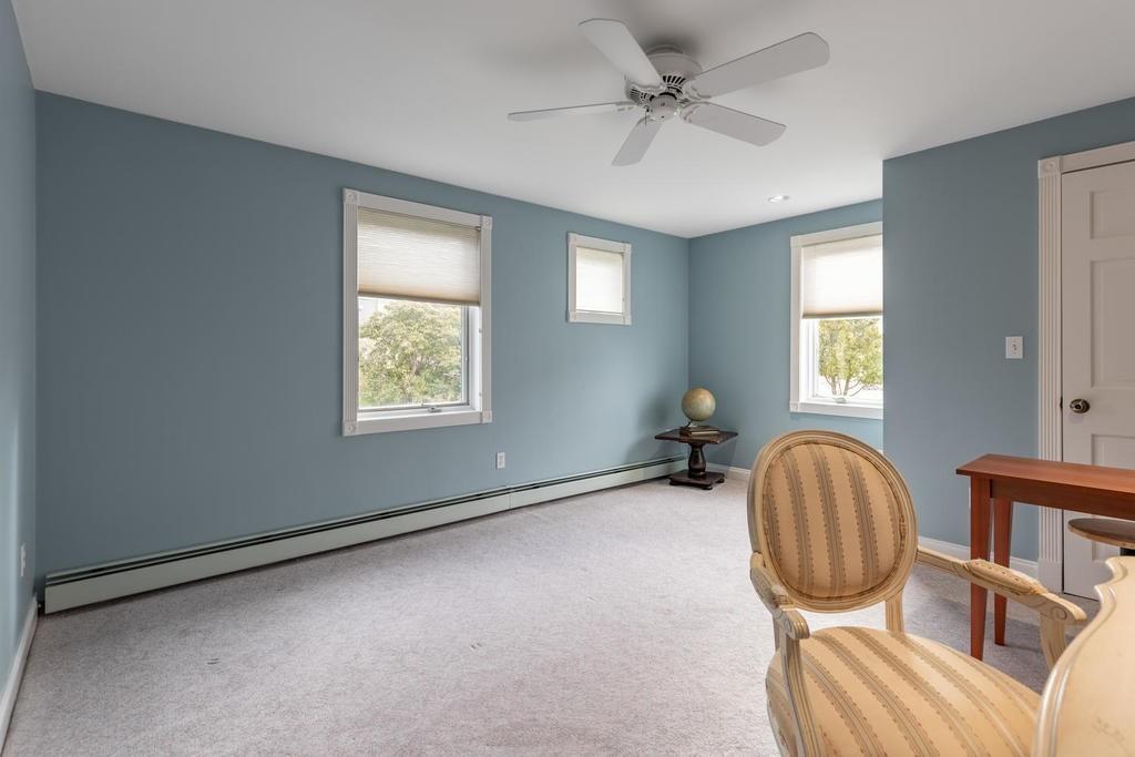 79 Clark Road Ipswich, MA 01938 - Photo 22 of 35 a room with gym equipment and windows