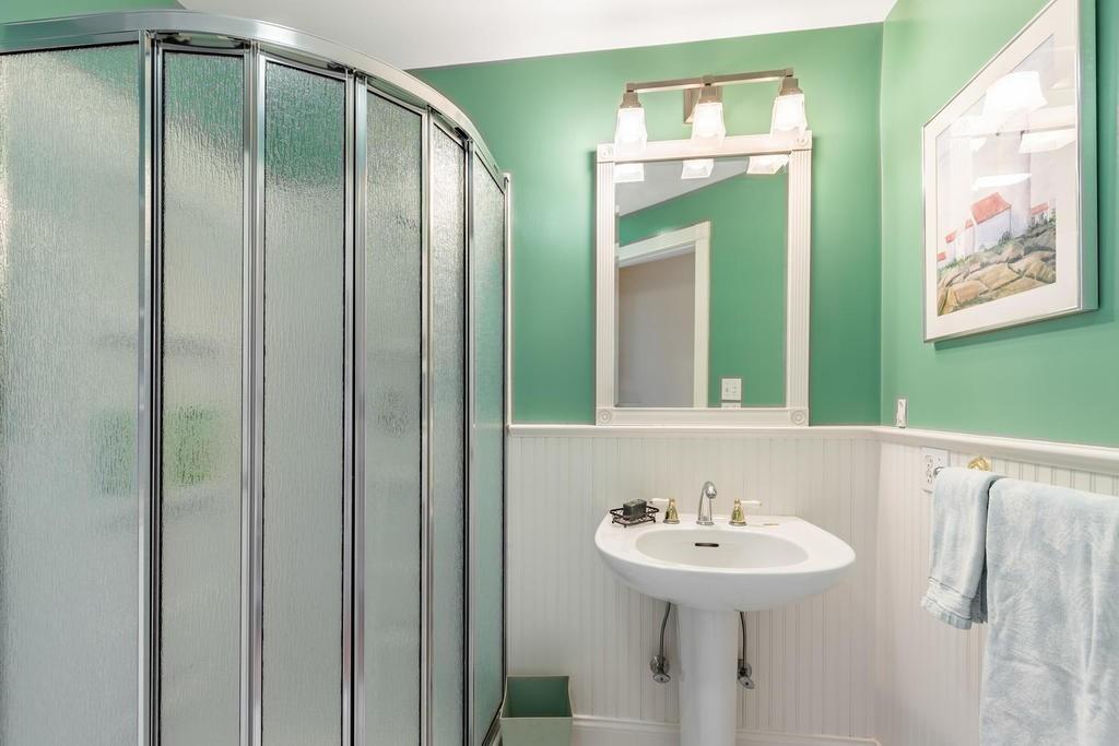 79 Clark Road Ipswich, MA 01938 - Photo 24 of 35 a bathroom with a sink and a mirror
