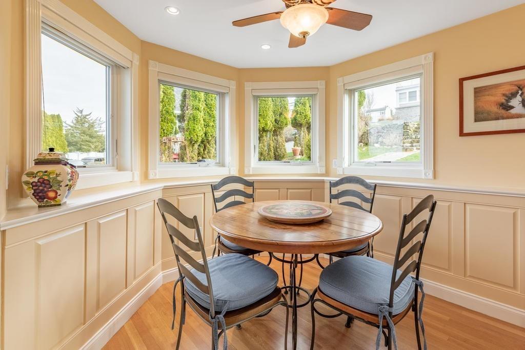 79 Clark Road Ipswich, MA 01938 - Photo 10 of 35 a dining room with furniture a chandelier and wooden floor