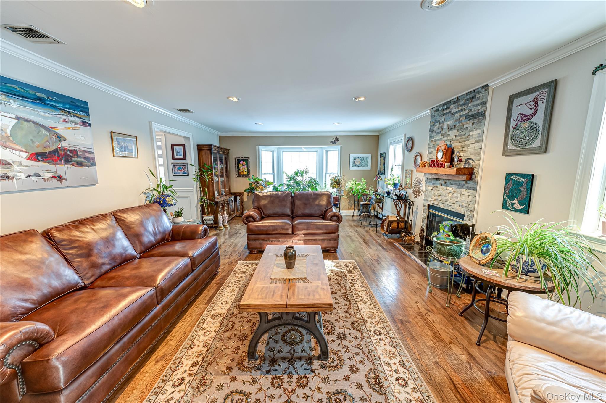 6 Sandy Hollow Road Centerport, NY 11768 - Photo 12 of 41 a living room with furniture and a fireplace
