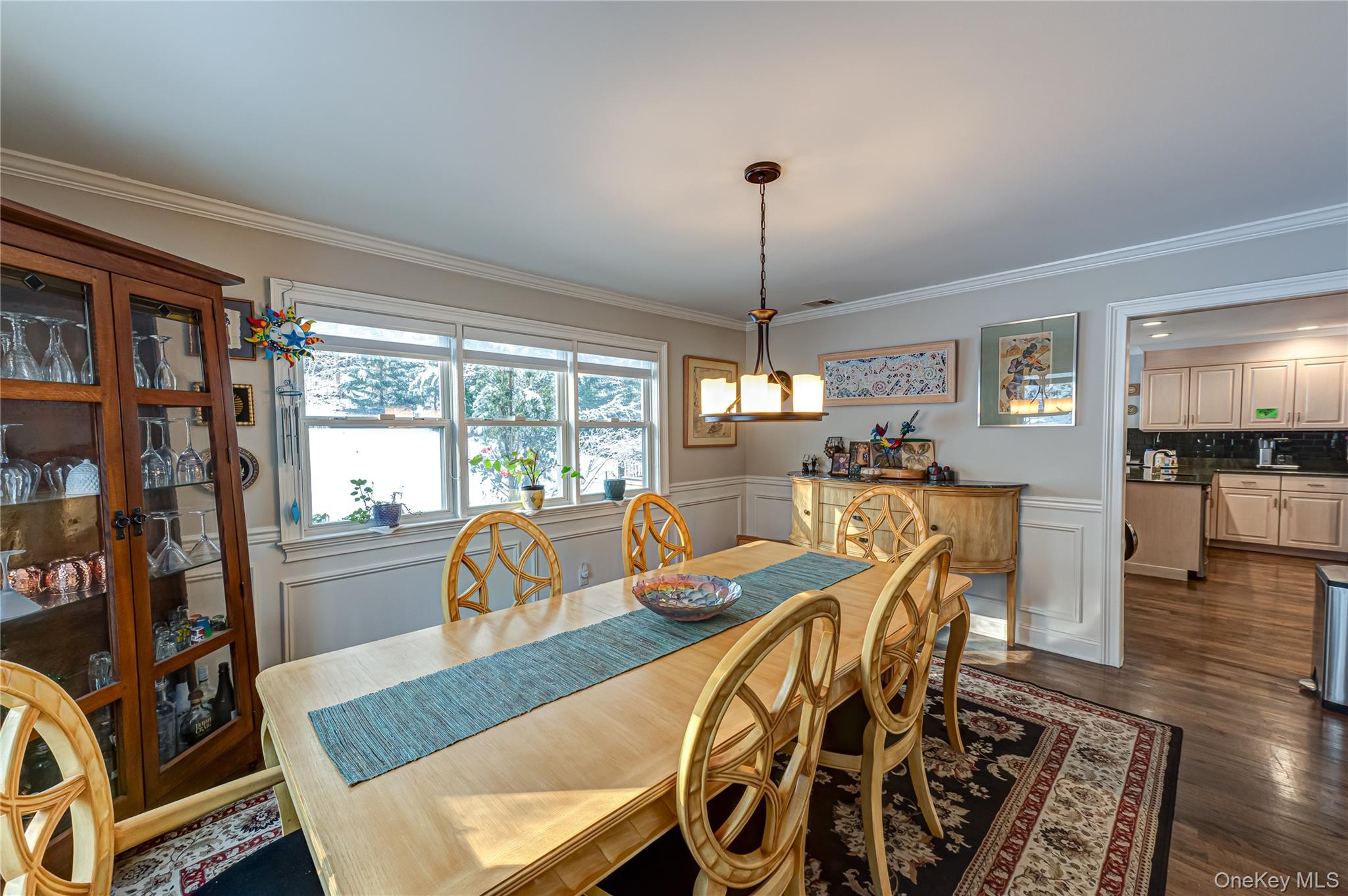 6 Sandy Hollow Road Centerport, NY 11768 - Photo 15 of 41 a view of a dining room with furniture window and wooden floor