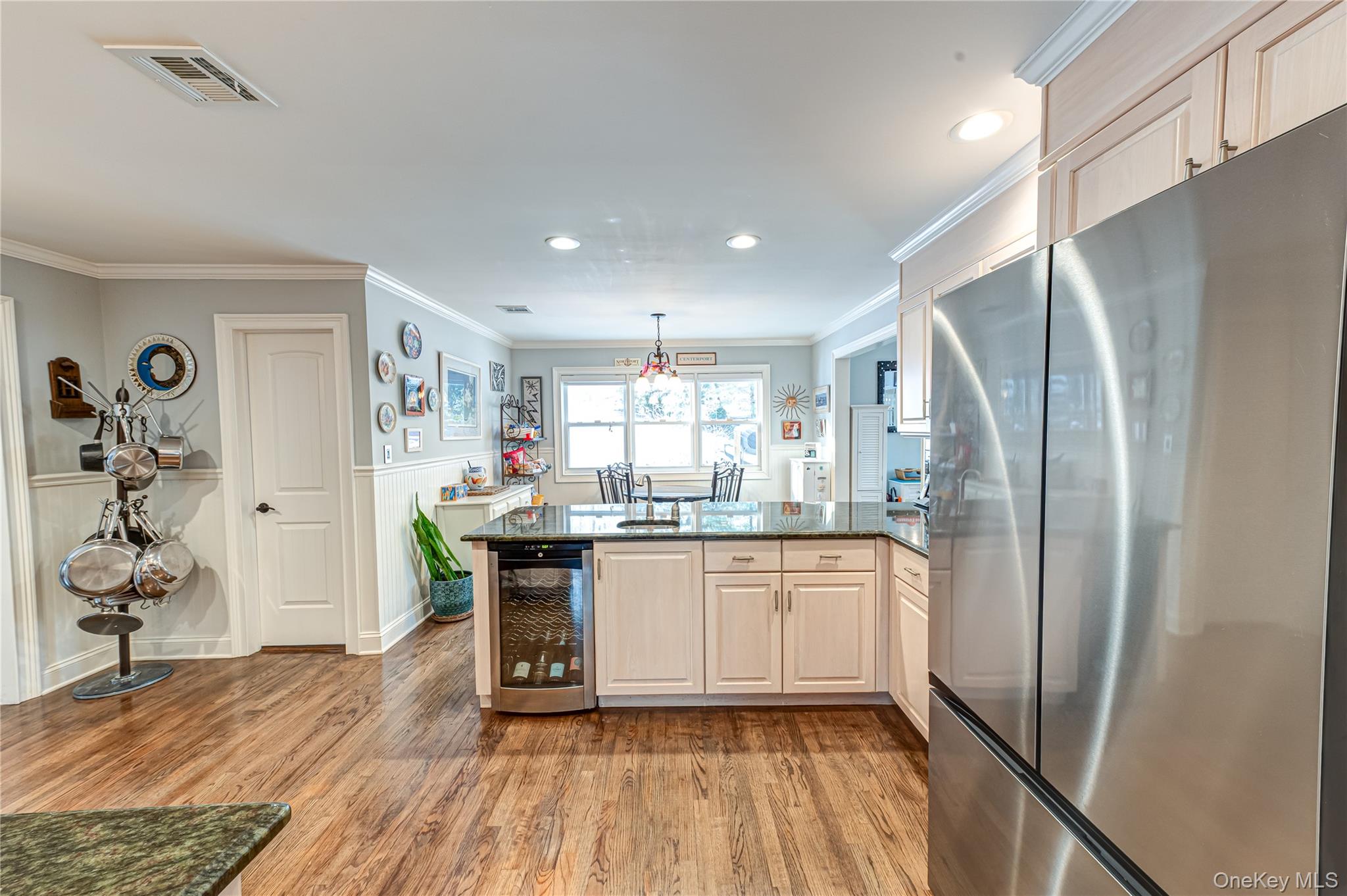 6 Sandy Hollow Road Centerport, NY 11768 - Photo 19 of 41 a kitchen with stainless steel appliances granite countertop a refrigerator and a sink