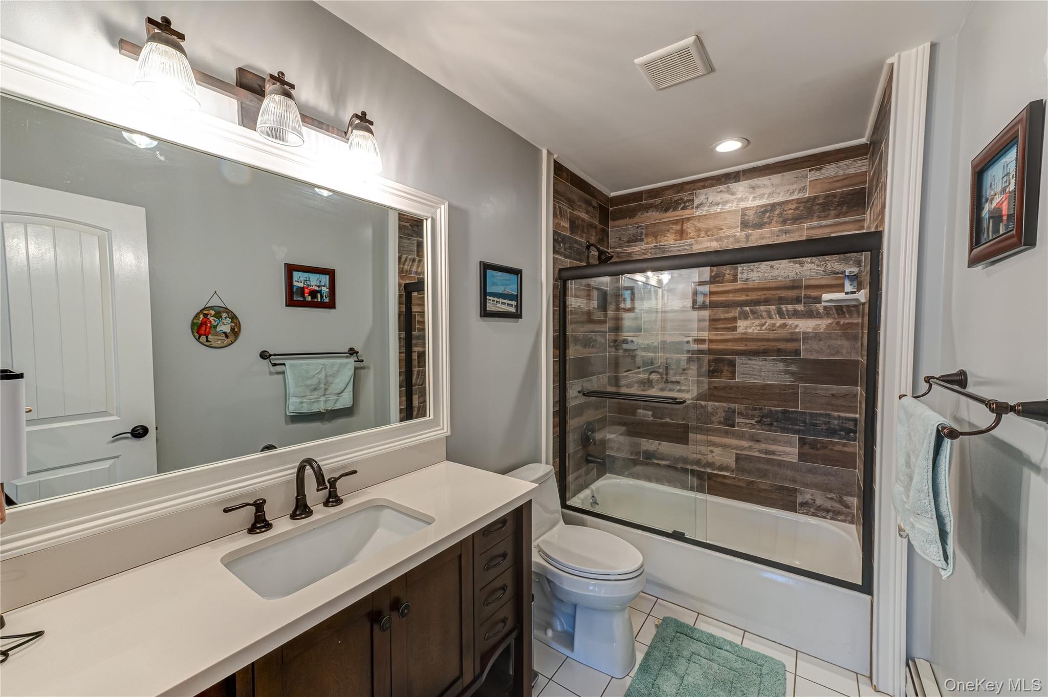 6 Sandy Hollow Road Centerport, NY 11768 - Photo 29 of 41 a bathroom with a sink a toilet and shower