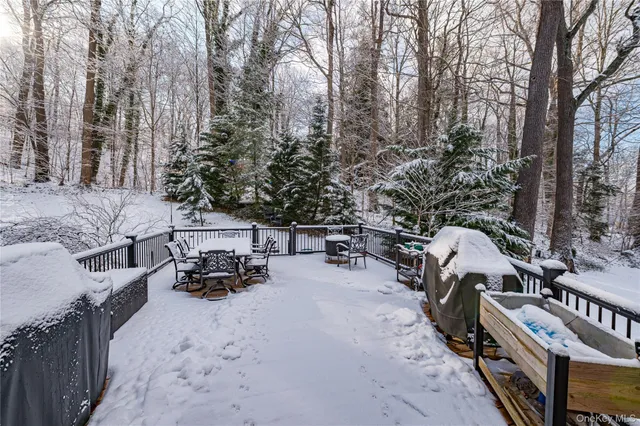 a view of a yard with a flower garden