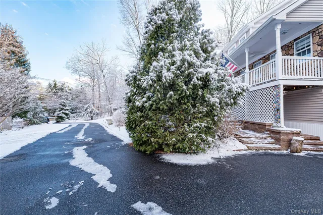 a picture of a room with a white wall and a picture of the wall