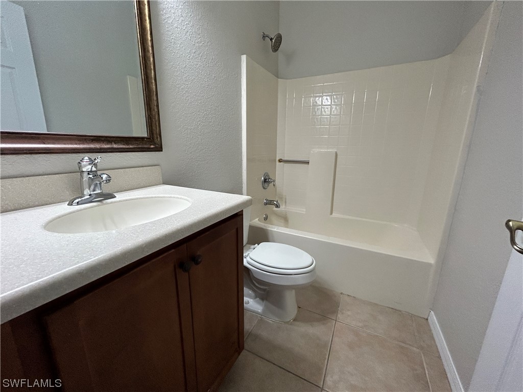 2562 Nature Pointe Loop Fort Myers, FL 33905 - Photo 27 of 44 a bathroom with a sink a toilet and shower