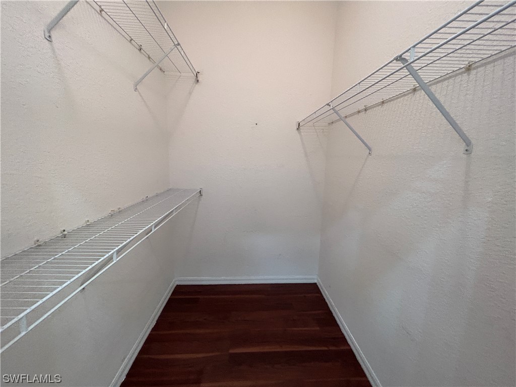 2562 Nature Pointe Loop Fort Myers, FL 33905 - Photo 38 of 44 a view of a room with racks on the wall