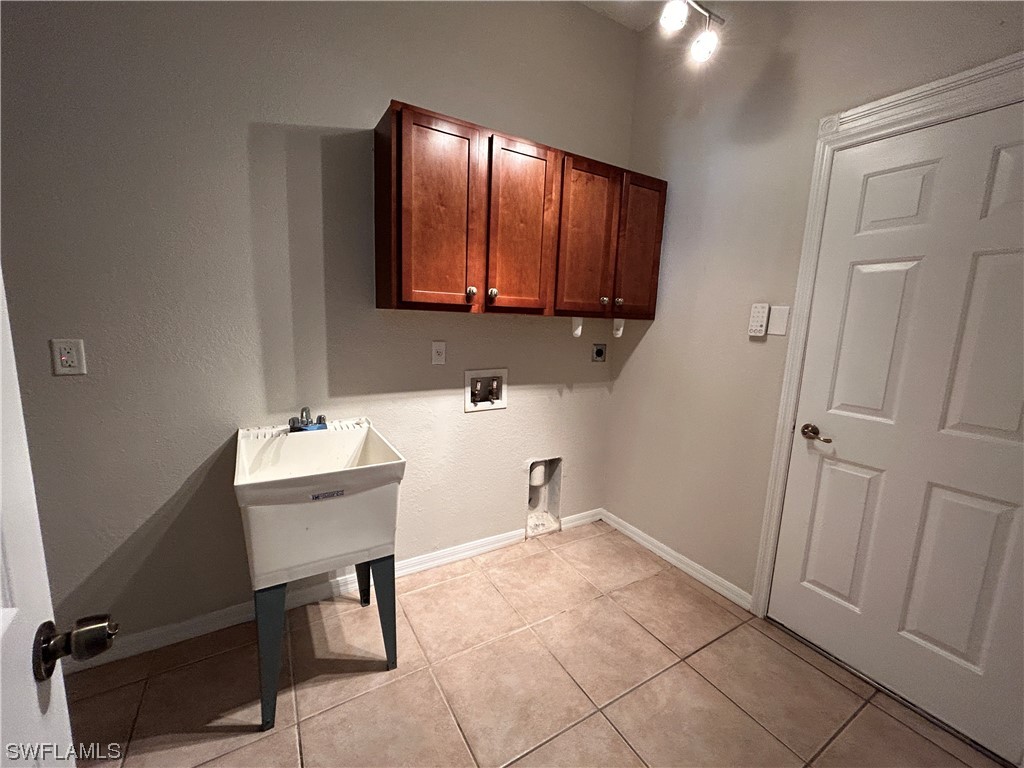 2562 Nature Pointe Loop Fort Myers, FL 33905 - Photo 43 of 44 a view of kitchen with cabinets