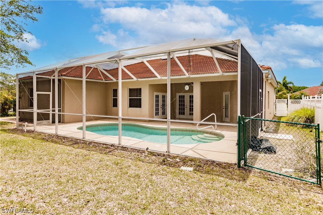 2562 Nature Pointe Loop Fort Myers, FL 33905 - Photo 8 of 44 a view of a house with a backyard