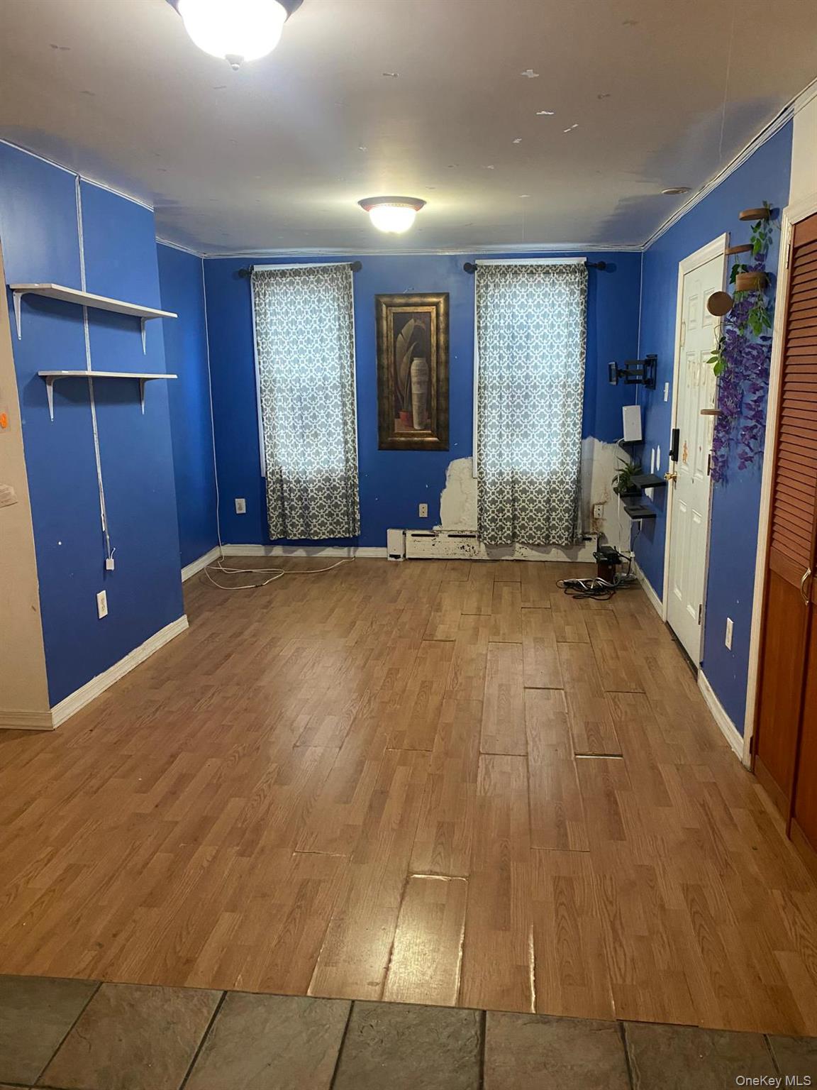 1351 Prospect Place Brooklyn, NY 11213 - Photo 12 of 20 Unfurnished living room with wood finished floors