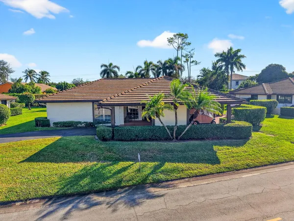 $550,000 | 440 Pine Villa Drive, Atlantis, FL 33462