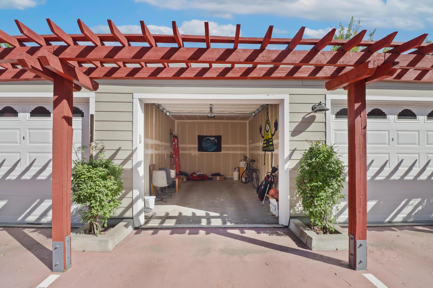 1818 Moore Boulevard, Unit 201 Davis, CA 95618 - Photo 25 of 40 a front view of a house with a garage