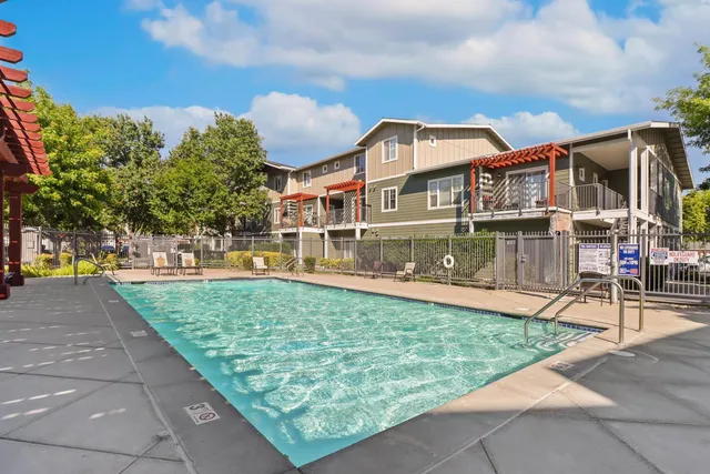 a view of a building with a yard