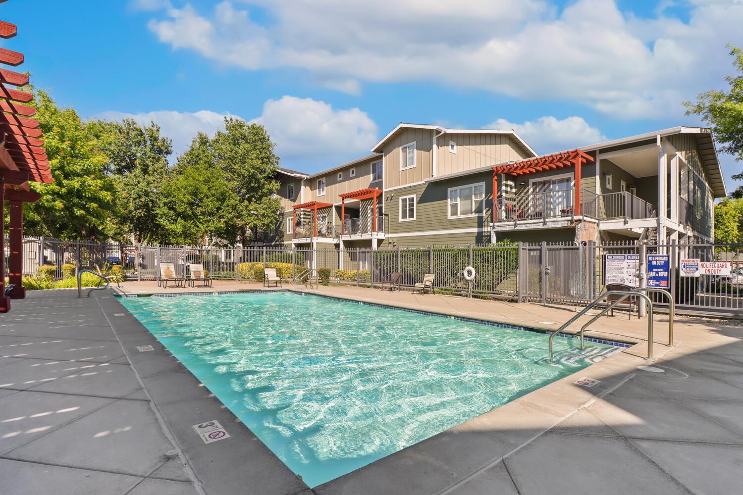1818 Moore Boulevard, Unit 201 Davis, CA 95618 - Photo 27 of 40 a view of a building with a yard
