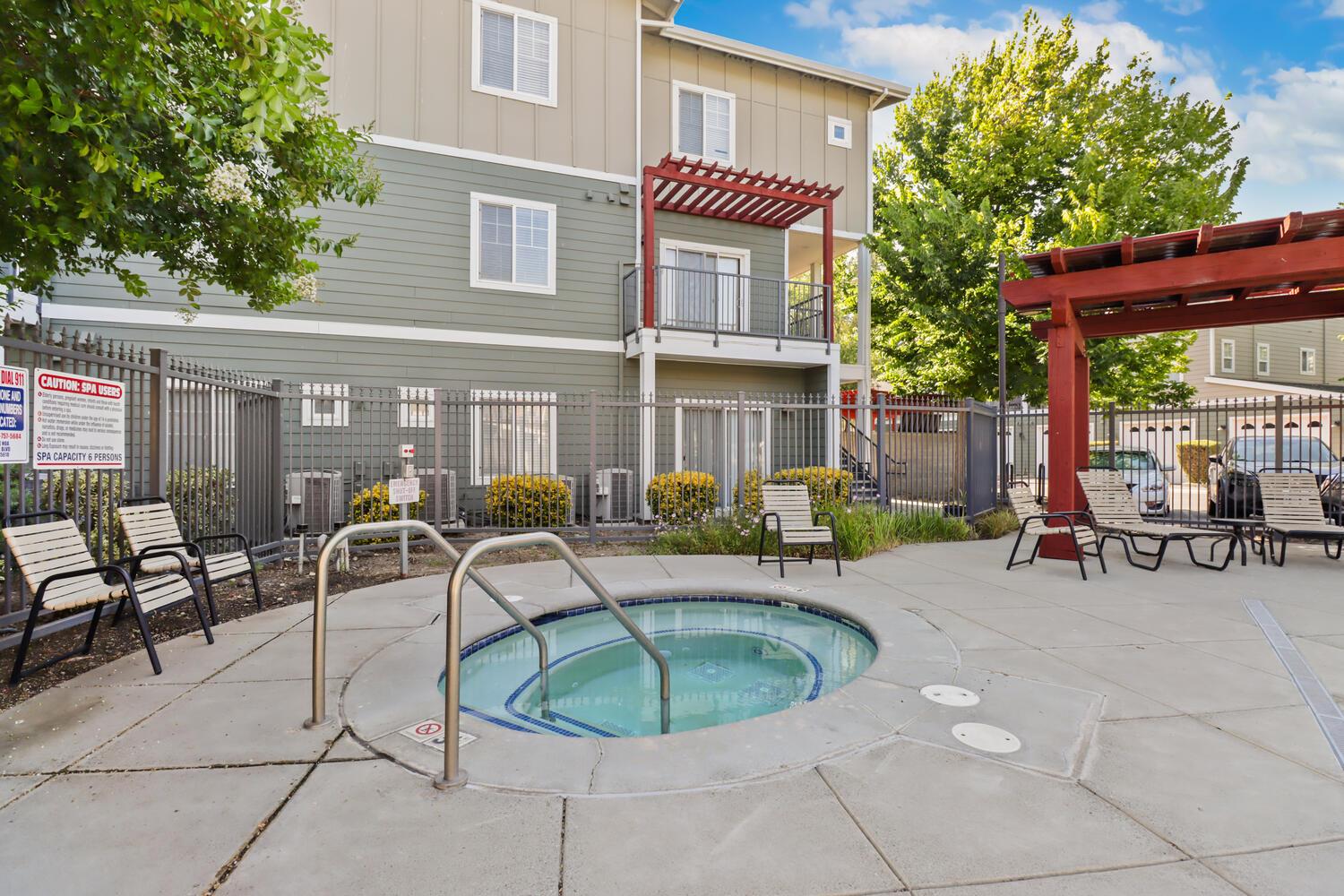 1818 Moore Boulevard, Unit 201 Davis, CA 95618 - Photo 28 of 40 a swimming pool with outdoor seating and yard