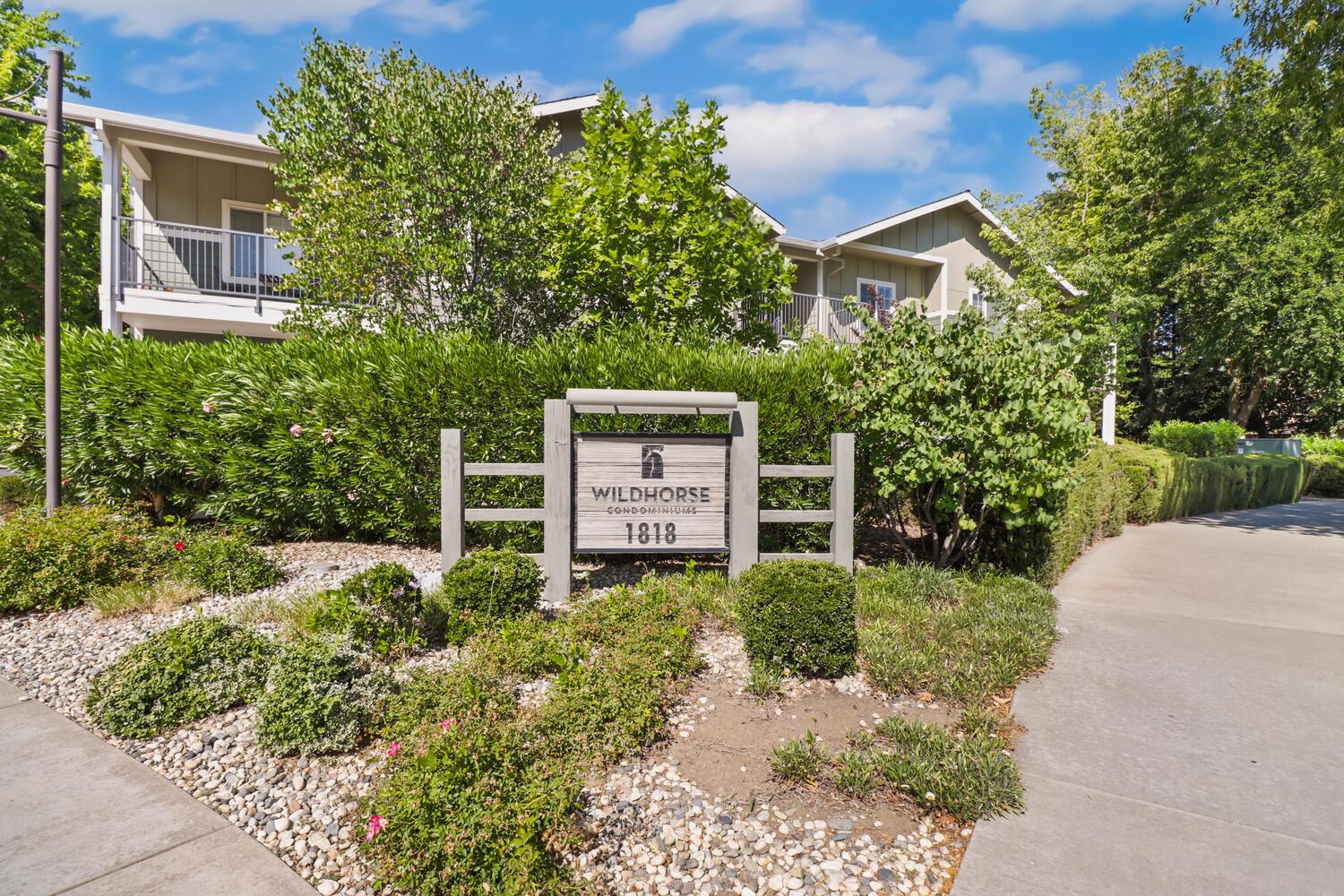 1818 Moore Boulevard, Unit 201 Davis, CA 95618 - Photo 29 of 40 a view of a house with a yard and plants