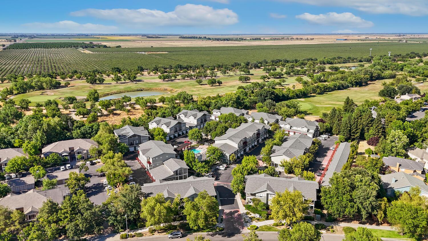 1818 Moore Boulevard, Unit 201 Davis, CA 95618 - Photo 31 of 40 an aerial view of a city and lake view