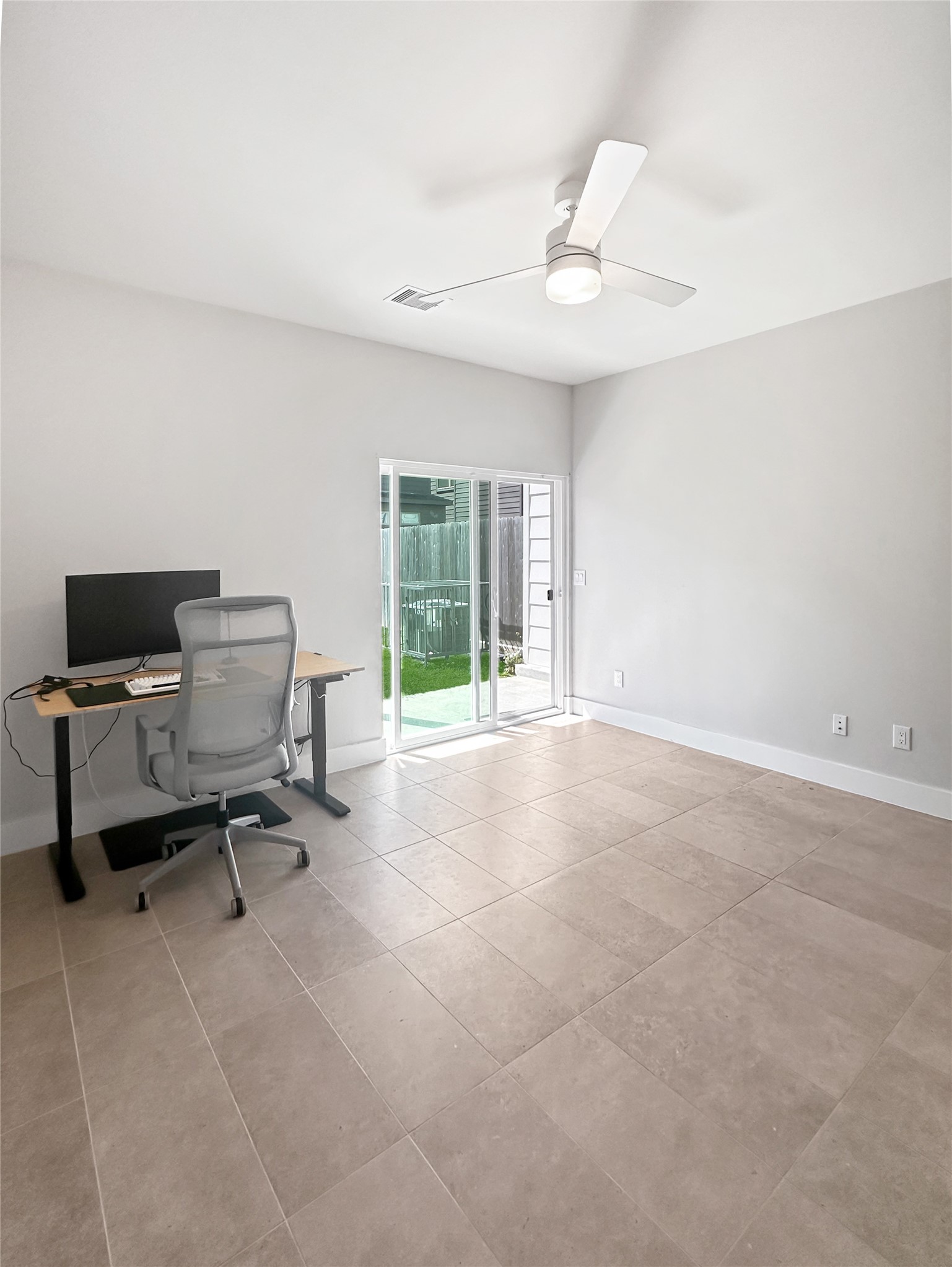 4702 Oats Street, Unit B Houston, TX 77020 - Photo 15 of 20 a view of workspace with furniture and windows