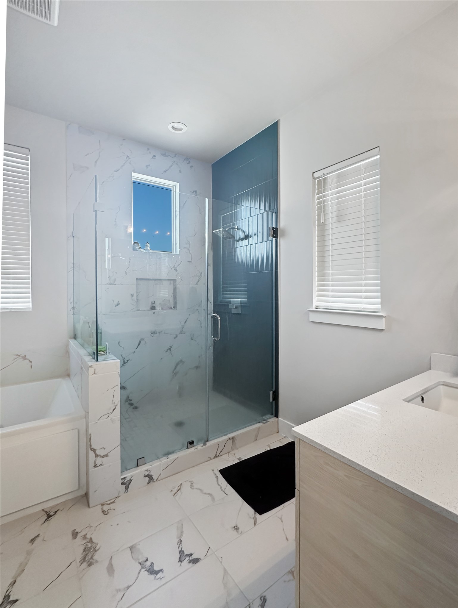 4702 Oats Street, Unit B Houston, TX 77020 - Photo 18 of 20 a bathroom with a bathtub and shower