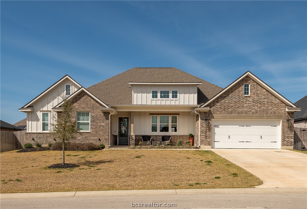 3317 Stone Leigh Lane Bryan, TX 77808 - Photo 1 of 30 a front view of a house with garden