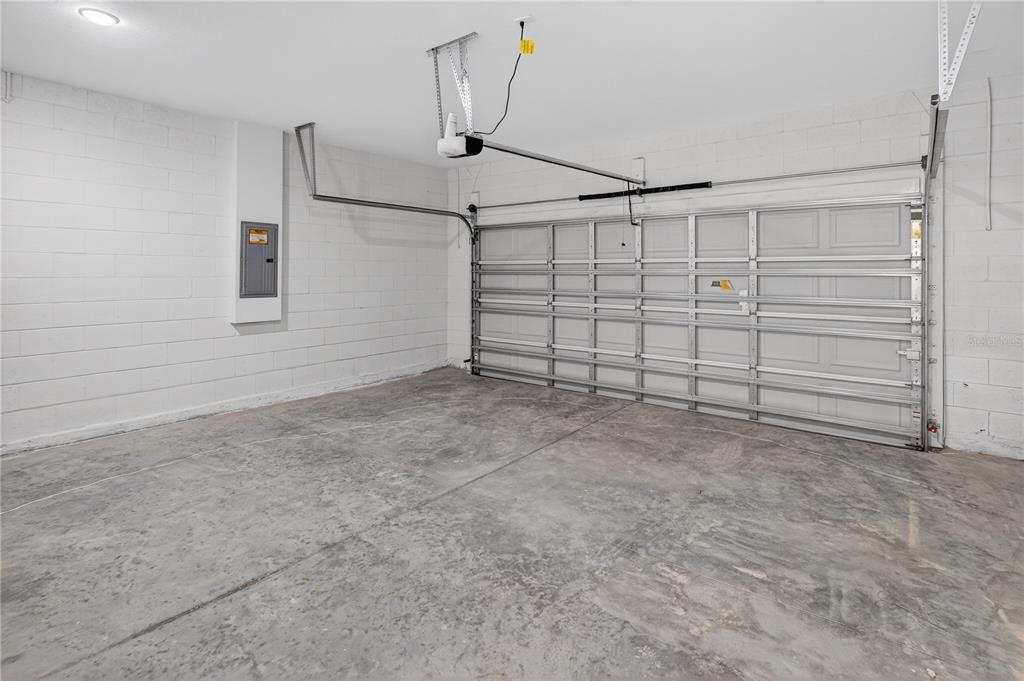 9066 North Akola Way Citrus Springs, FL 34434 - Photo 23 of 32 a view of a garage