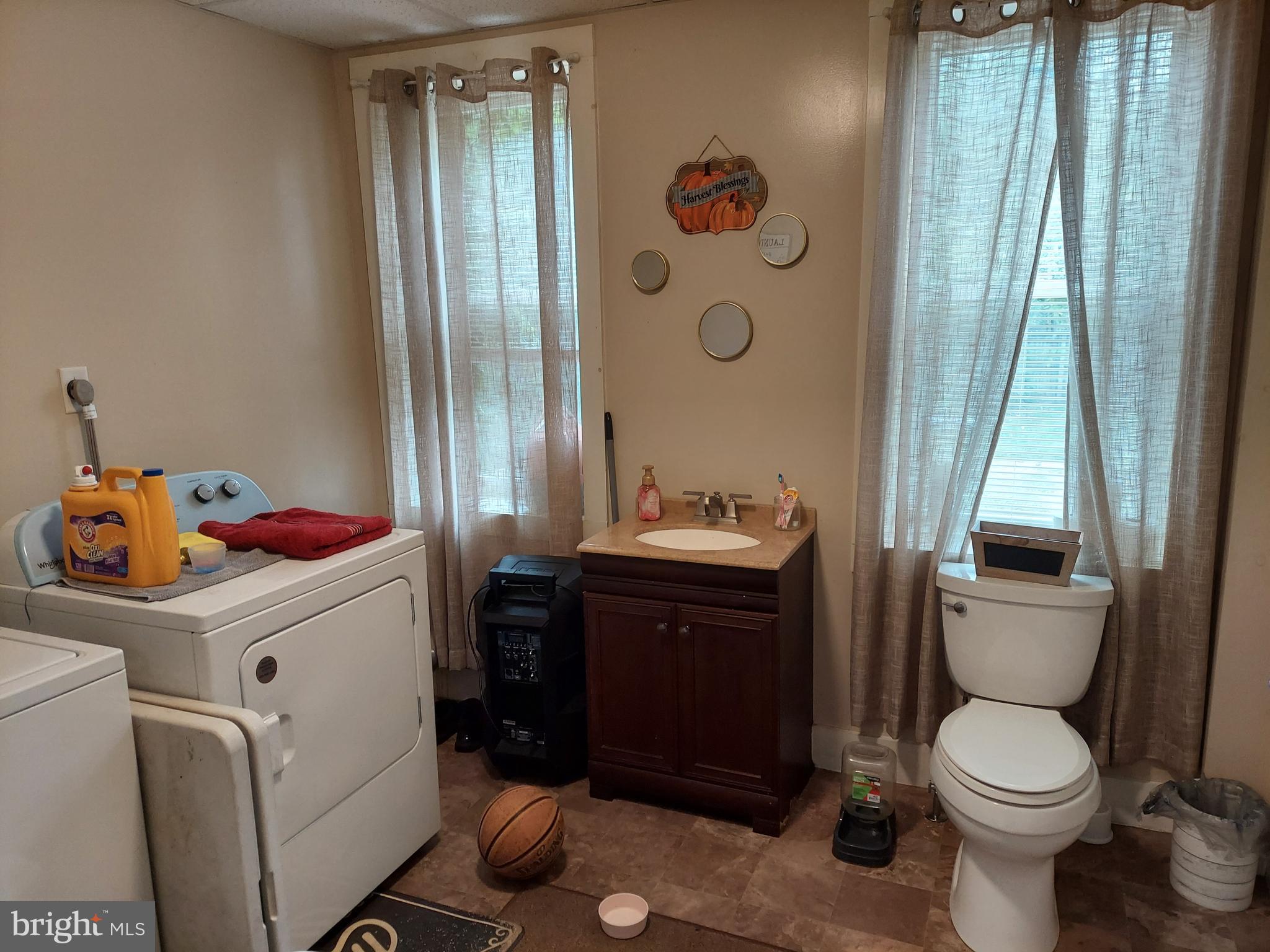 560 North Pershing Avenue York, PA 17404 - Photo 6 of 13 a bathroom with a sink a toilet and shower curtain
