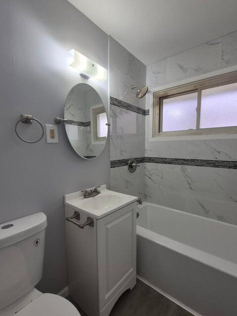 3326 Delaware Street Gary, IN 46409 - Photo 5 of 13 a bathroom with a sink a toilet and mirror
