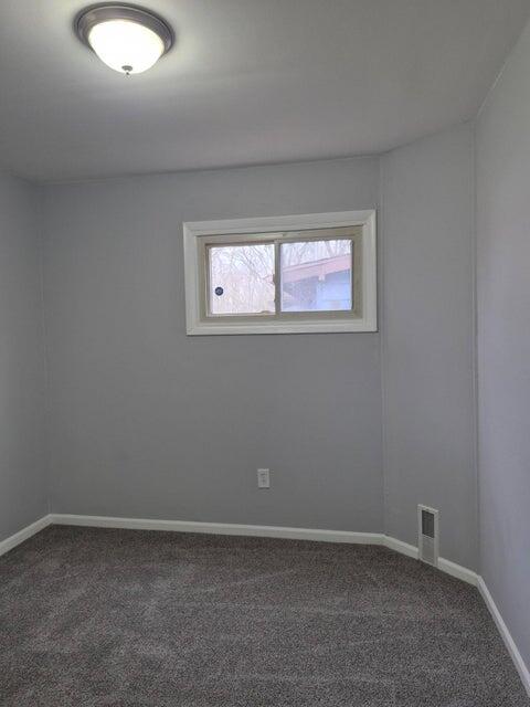 3326 Delaware Street Gary, IN 46409 - Photo 7 of 13 an empty room with windows