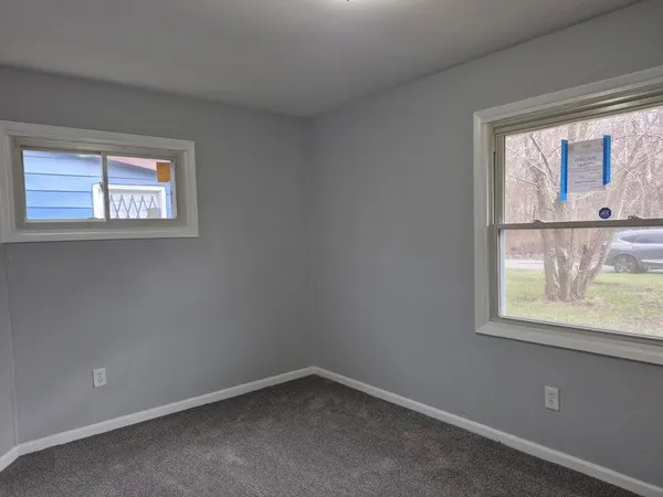 an empty room with a window