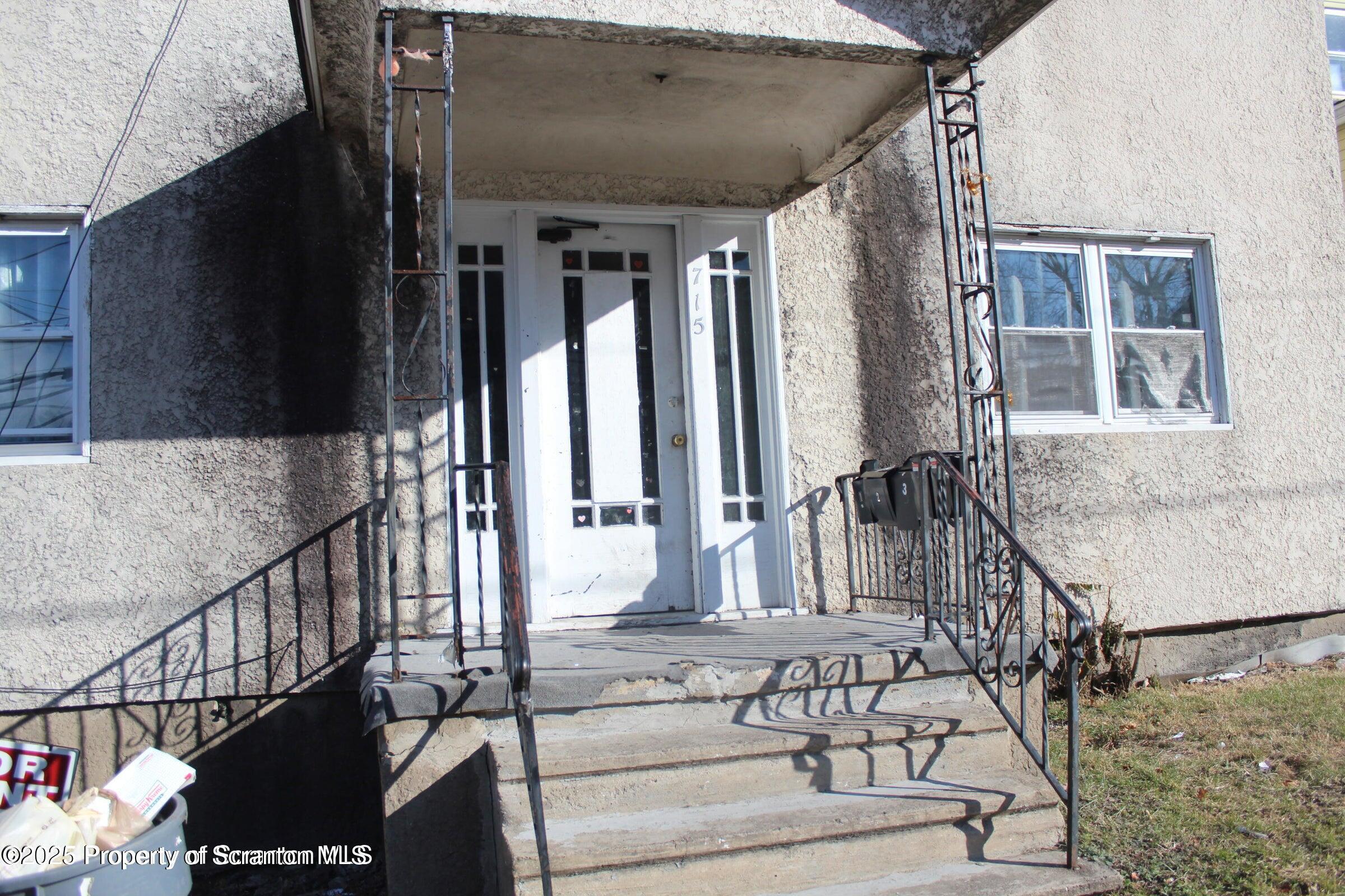 a view of balcony with furniture
