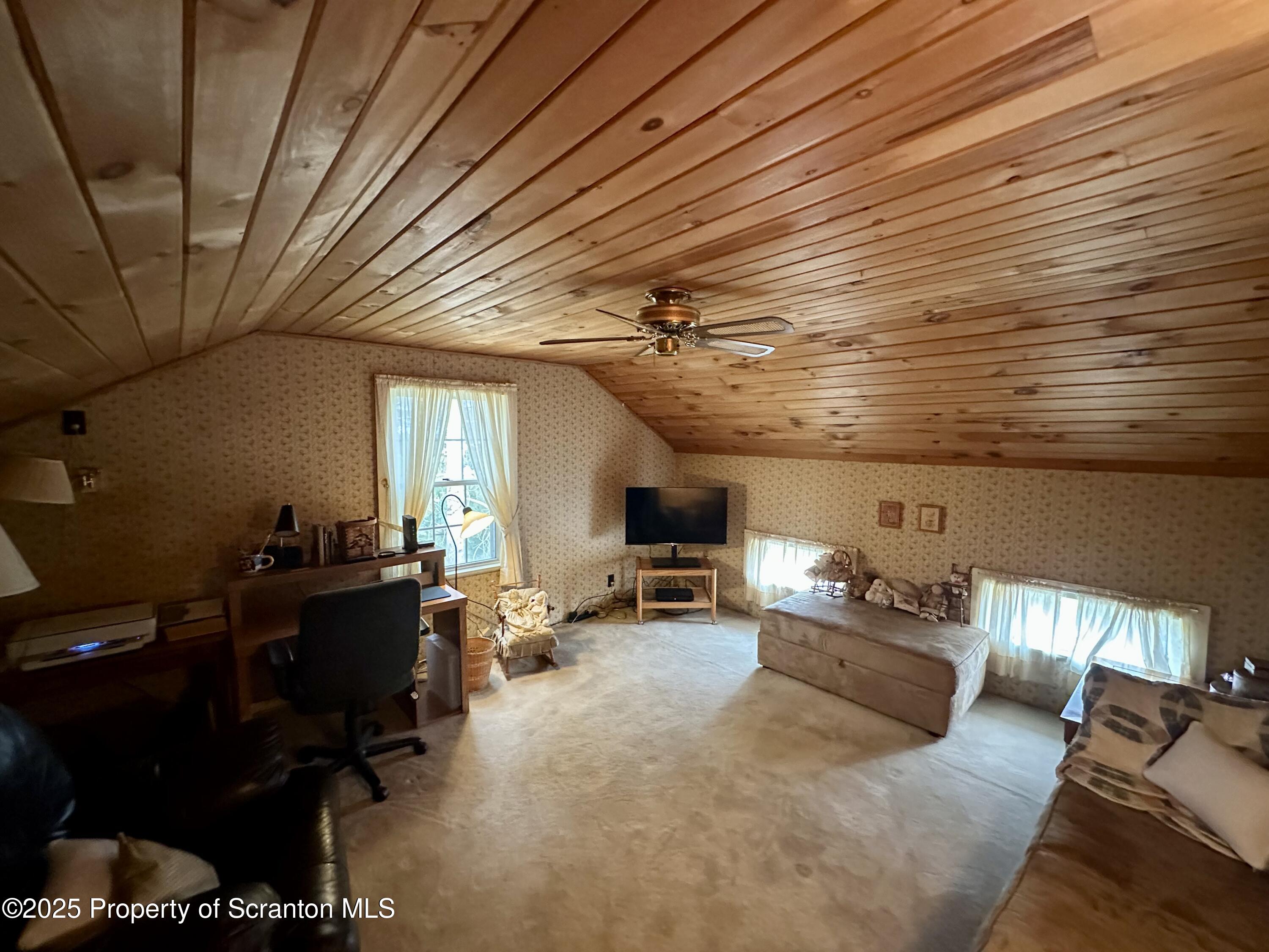 1033 Sugar Hollow Road Tunkhannock, PA 18657 - Photo 22 of 27 a living room with furniture