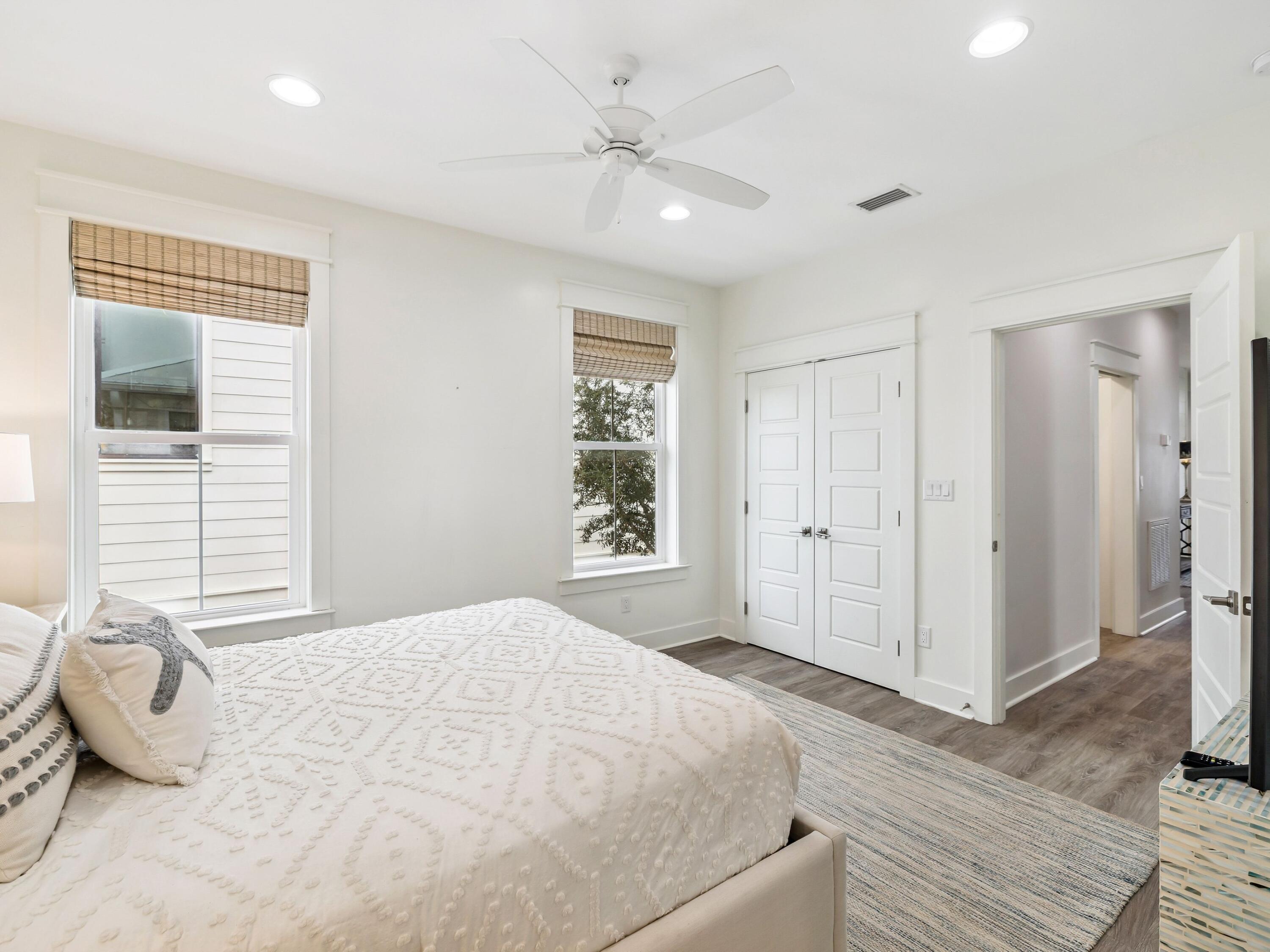 29 Tidewater Ct Inlet Beach Inlet Beach, FL 32461 - Photo 20 of 25 a spacious bedroom with a bed and a window