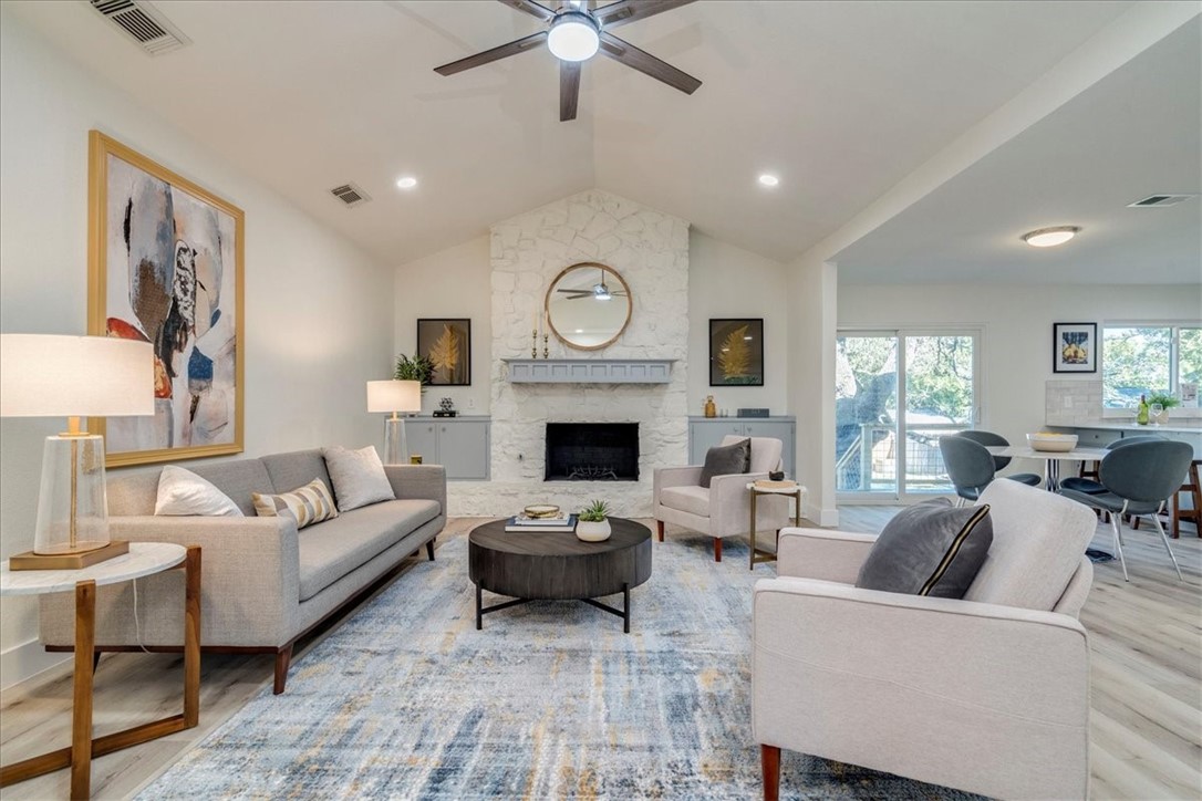 11802 Rust Road Austin, TX 78750 - Photo 1 of 1 Impressive living room with tall vaulted ceiling and lots of natural light!