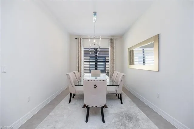 a kitchen with stainless steel appliances kitchen island granite countertop a sink and cabinets