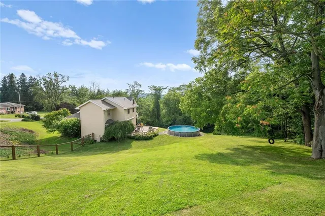 a view of a playground with basketball court