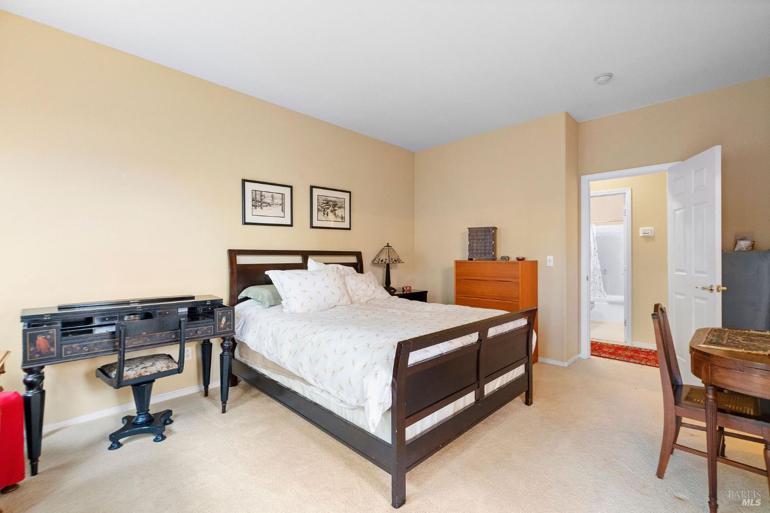 672 Meadowbrook Lane Rio Vista, CA 94571 - Photo 12 of 39 a bedroom with a bed and chair