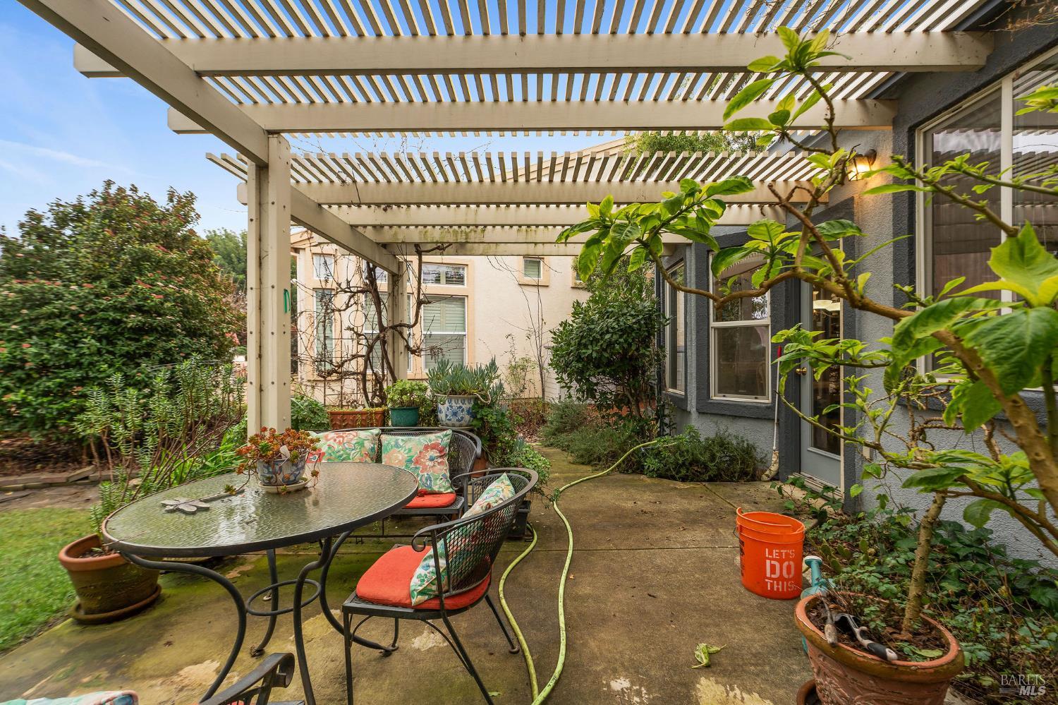 672 Meadowbrook Lane Rio Vista, CA 94571 - Photo 20 of 39 a table and chairs in a patio