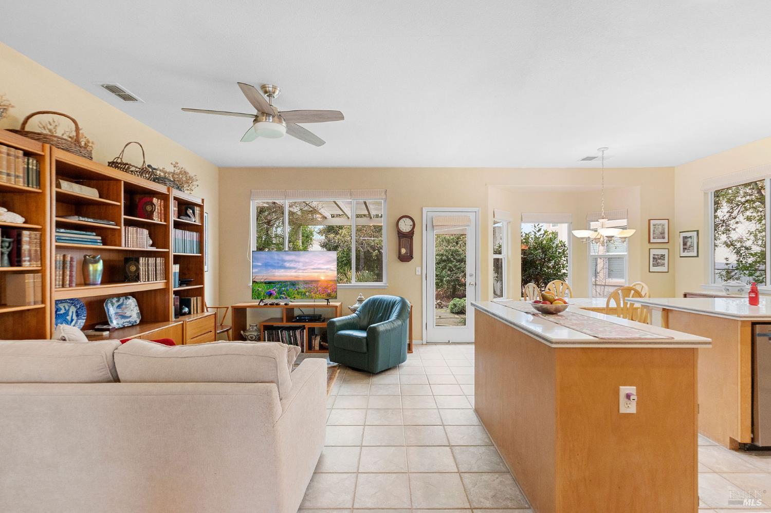 672 Meadowbrook Lane Rio Vista, CA 94571 - Photo 7 of 39 a living room with furniture and a floor to ceiling window